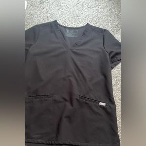 Figs scrub top in black. Size medium. Like new condition